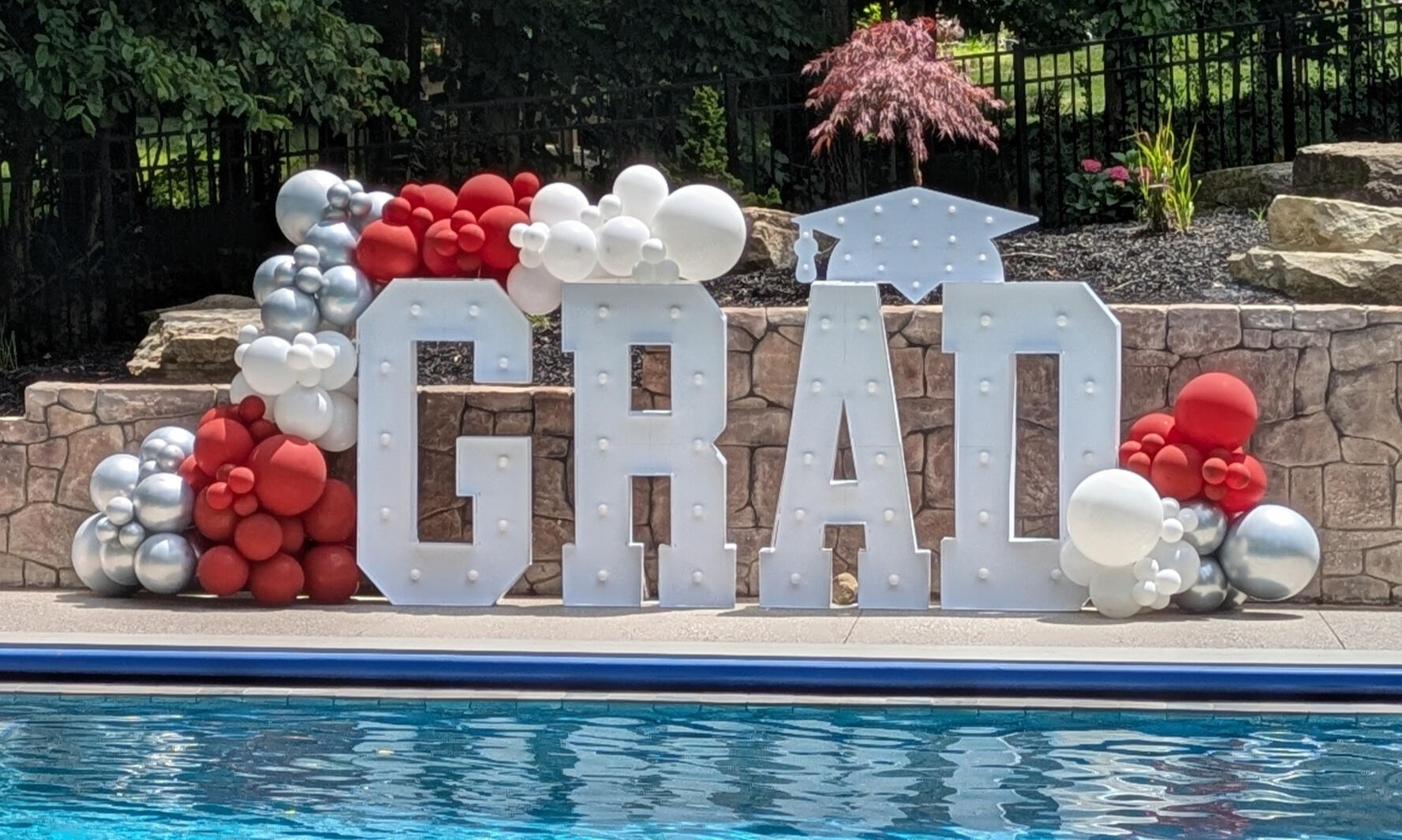 GRAD Sign with Balloons GRAD Sign with Balloons